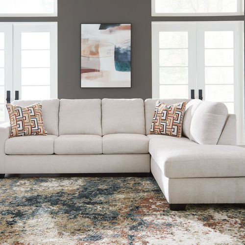 Beige L-Shaped Corner Sofa with Chaise Longue and Decorative Throw Pillows