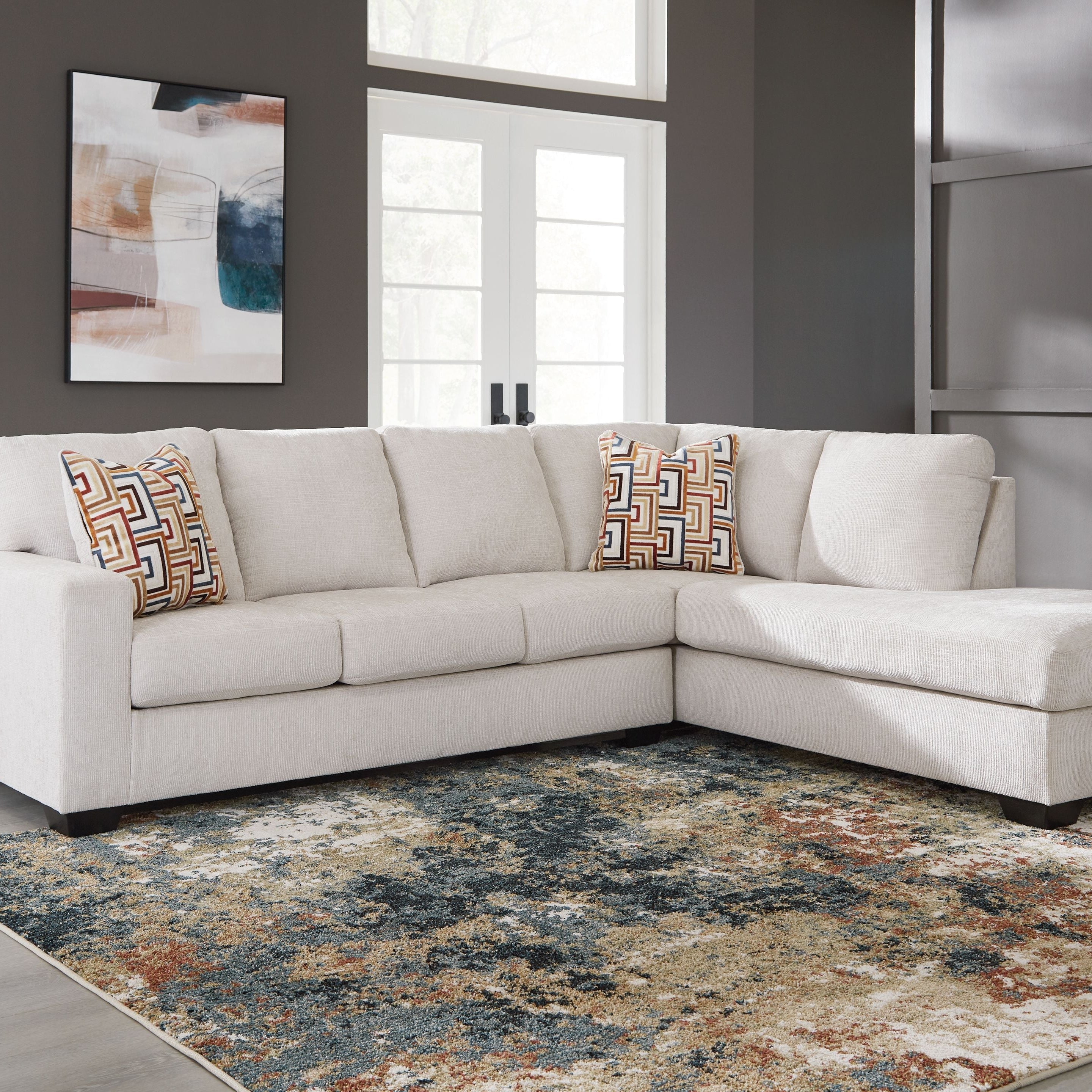 Beige L-Shaped Corner Sofa with Chaise Longue and Decorative Throw Pillows